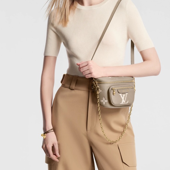 Brand new Louis Vuitton mini bumbag in bicolor monogram empreinte leather. - Picture 5 of 16